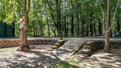 Experience ultimate privacy and breathtaking views from this on The Highlands Course at Lake Arrowhead in Georgia - for sale on GolfHomes.com, golf home, golf lot