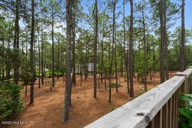 Welcome to this beautifully updated single-level home, perfectly on Pinewild Country Club of Pinehurst in North Carolina - for sale on GolfHomes.com, golf home, golf lot