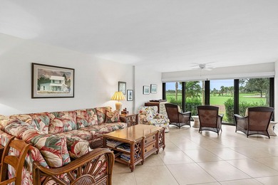 Exceptional golf course views wrap around this renovated on Quail Ridge Golf Course and Country Club in Florida - for sale on GolfHomes.com, golf home, golf lot