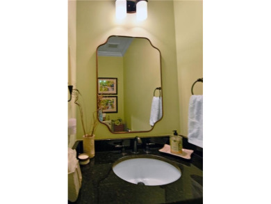 Located in a quiet community, and just as you arrive on St on Sea Island Golf Club in Georgia - for sale on GolfHomes.com, golf home, golf lot