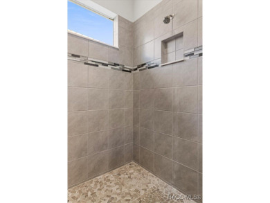 Enjoy incredible savings and move into a like-new home--without on Skyview At Terra Vista Golf and Country Club in Florida - for sale on GolfHomes.com, golf home, golf lot