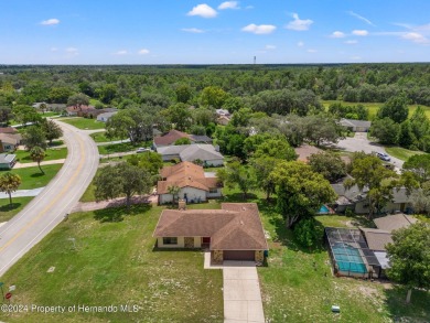 CUTE 2BED 2BATH 2CAR OVERSIZED CORNER LOT HOME IN THE HEATHER! A on Heather Golf and Country Club in Florida - for sale on GolfHomes.com, golf home, golf lot