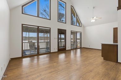 Exceptional Waterfront Retreat in beautiful Lake Royale! This on River Golf and Country Club at Lake Royale in North Carolina - for sale on GolfHomes.com, golf home, golf lot