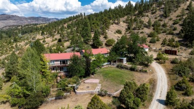 An oasis on the hill overlooks the lush climbing landscapes of on Norwegian Wood Golf Course in Montana - for sale on GolfHomes.com, golf home, golf lot