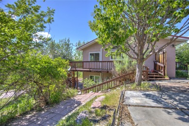 An oasis on the hill overlooks the lush climbing landscapes of on Norwegian Wood Golf Course in Montana - for sale on GolfHomes.com, golf home, golf lot