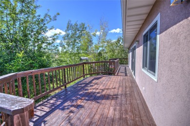 An oasis on the hill overlooks the lush climbing landscapes of on Norwegian Wood Golf Course in Montana - for sale on GolfHomes.com, golf home, golf lot