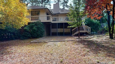 Welcome to this charming and spacious one-story home situated on on Whispering Pines Golf Course in North Carolina - for sale on GolfHomes.com, golf home, golf lot