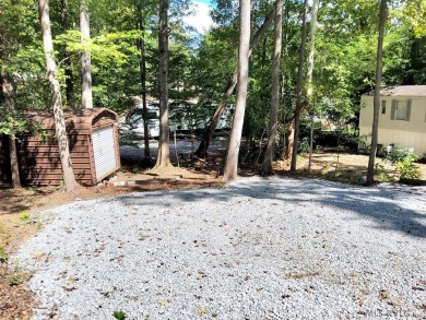 Great vacant  lot ready for your home. Lot has been mostly on River Ridge Golf Club in Virginia - for sale on GolfHomes.com, golf home, golf lot