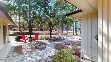 Welcome to this charming and spacious one-story home situated on on Whispering Pines Golf Course in North Carolina - for sale on GolfHomes.com, golf home, golf lot