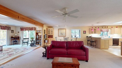 Welcome to this charming and spacious one-story home situated on on Whispering Pines Golf Course in North Carolina - for sale on GolfHomes.com, golf home, golf lot