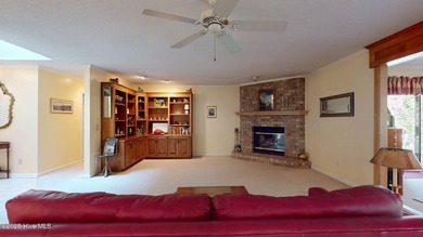 Welcome to this charming and spacious one-story home situated on on Whispering Pines Golf Course in North Carolina - for sale on GolfHomes.com, golf home, golf lot