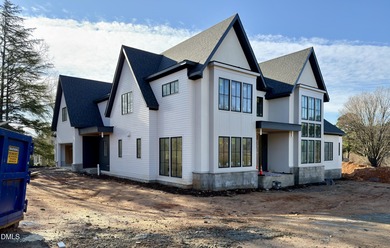 Located in a prime setting within North Raleigh's premier on North Ridge Country Club in North Carolina - for sale on GolfHomes.com, golf home, golf lot