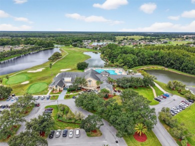 Located in the vibrant, guard-gated 55+ Tampa Bay Golf and on Tampa Bay Golf and Country Club in Florida - for sale on GolfHomes.com, golf home, golf lot
