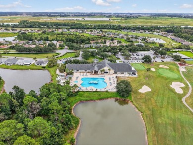 Located in the vibrant, guard-gated 55+ Tampa Bay Golf and on Tampa Bay Golf and Country Club in Florida - for sale on GolfHomes.com, golf home, golf lot