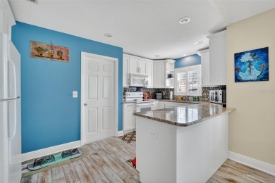 Located in the vibrant, guard-gated 55+ Tampa Bay Golf and on Tampa Bay Golf and Country Club in Florida - for sale on GolfHomes.com, golf home, golf lot