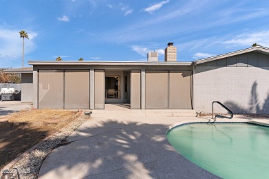 Welcome to your dream home! This beautiful 4-bedroom, 2-bathroom on Dobson Ranch Municipal Golf Course in Arizona - for sale on GolfHomes.com, golf home, golf lot