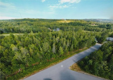 This large 1 acre wooded lot in Eagle Ridge Estates is located on Eagle Ridge Golf Course in Minnesota - for sale on GolfHomes.com, golf home, golf lot