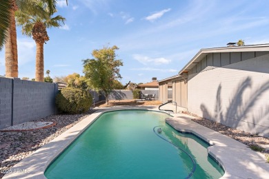 Welcome to your dream home! This beautiful 4-bedroom, 2-bathroom on Dobson Ranch Municipal Golf Course in Arizona - for sale on GolfHomes.com, golf home, golf lot