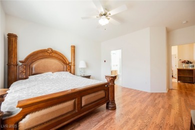 Step into the vibrant lifestyle of Sun City MacDonald Ranch, one on Desert Willow Golf Course in Nevada - for sale on GolfHomes.com, golf home, golf lot