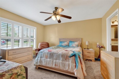 Located in the vibrant, guard-gated 55+ Tampa Bay Golf and on Tampa Bay Golf and Country Club in Florida - for sale on GolfHomes.com, golf home, golf lot