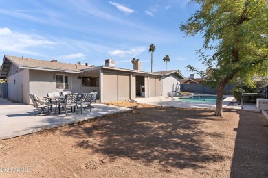 Welcome to your dream home! This beautiful 4-bedroom, 2-bathroom on Dobson Ranch Municipal Golf Course in Arizona - for sale on GolfHomes.com, golf home, golf lot