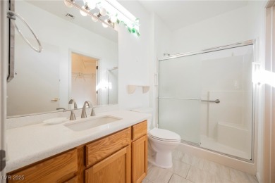 Step into the vibrant lifestyle of Sun City MacDonald Ranch, one on Desert Willow Golf Course in Nevada - for sale on GolfHomes.com, golf home, golf lot