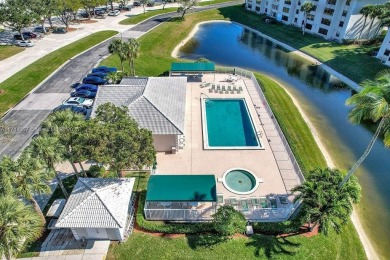 Welcome to this beautifully renovated farmhouse-style condo in on The Country Club At Boca Raton in Florida - for sale on GolfHomes.com, golf home, golf lot