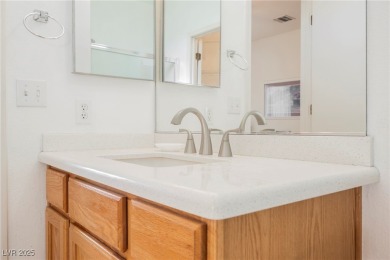 Step into the vibrant lifestyle of Sun City MacDonald Ranch, one on Desert Willow Golf Course in Nevada - for sale on GolfHomes.com, golf home, golf lot