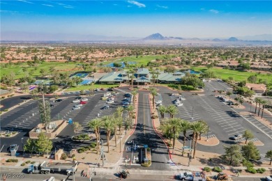 Step into the vibrant lifestyle of Sun City MacDonald Ranch, one on Desert Willow Golf Course in Nevada - for sale on GolfHomes.com, golf home, golf lot