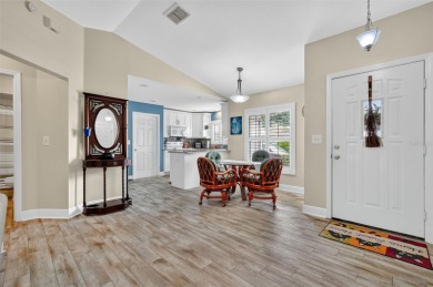 Located in the vibrant, guard-gated 55+ Tampa Bay Golf and on Tampa Bay Golf and Country Club in Florida - for sale on GolfHomes.com, golf home, golf lot