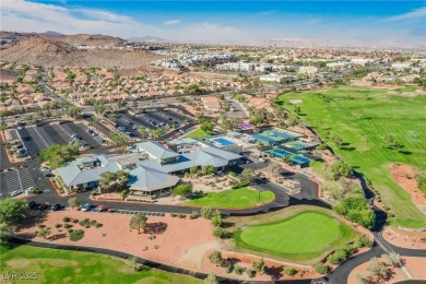 Step into the vibrant lifestyle of Sun City MacDonald Ranch, one on Desert Willow Golf Course in Nevada - for sale on GolfHomes.com, golf home, golf lot