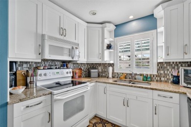 Located in the vibrant, guard-gated 55+ Tampa Bay Golf and on Tampa Bay Golf and Country Club in Florida - for sale on GolfHomes.com, golf home, golf lot