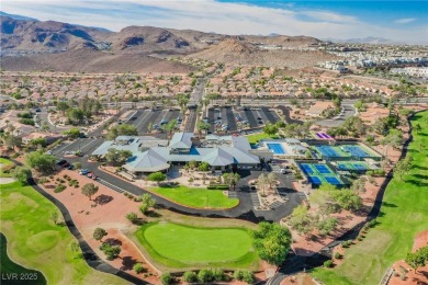 Step into the vibrant lifestyle of Sun City MacDonald Ranch, one on Desert Willow Golf Course in Nevada - for sale on GolfHomes.com, golf home, golf lot