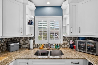 Located in the vibrant, guard-gated 55+ Tampa Bay Golf and on Tampa Bay Golf and Country Club in Florida - for sale on GolfHomes.com, golf home, golf lot