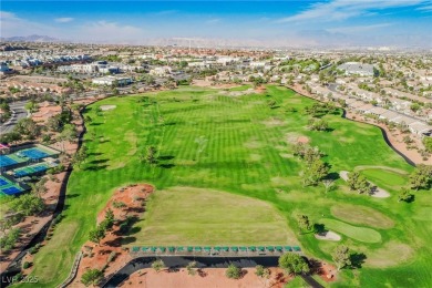 Step into the vibrant lifestyle of Sun City MacDonald Ranch, one on Desert Willow Golf Course in Nevada - for sale on GolfHomes.com, golf home, golf lot