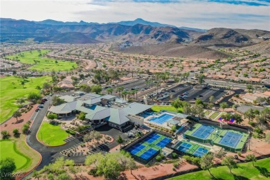 Step into the vibrant lifestyle of Sun City MacDonald Ranch, one on Desert Willow Golf Course in Nevada - for sale on GolfHomes.com, golf home, golf lot