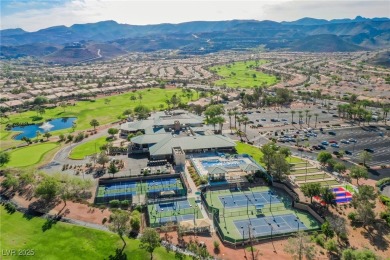 Step into the vibrant lifestyle of Sun City MacDonald Ranch, one on Desert Willow Golf Course in Nevada - for sale on GolfHomes.com, golf home, golf lot
