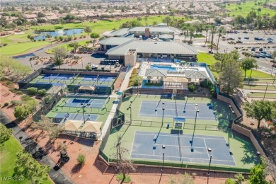 Step into the vibrant lifestyle of Sun City MacDonald Ranch, one on Desert Willow Golf Course in Nevada - for sale on GolfHomes.com, golf home, golf lot