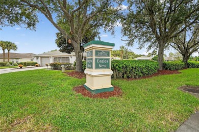 Located in the vibrant, guard-gated 55+ Tampa Bay Golf and on Tampa Bay Golf and Country Club in Florida - for sale on GolfHomes.com, golf home, golf lot