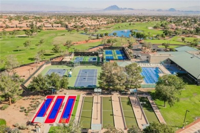 Step into the vibrant lifestyle of Sun City MacDonald Ranch, one on Desert Willow Golf Course in Nevada - for sale on GolfHomes.com, golf home, golf lot