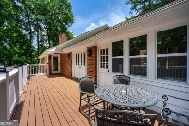 Stunning lakefront home offering an exceptional blend of luxury on Highland Country Club in Georgia - for sale on GolfHomes.com, golf home, golf lot
