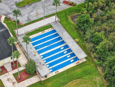Located in the vibrant, guard-gated 55+ Tampa Bay Golf and on Tampa Bay Golf and Country Club in Florida - for sale on GolfHomes.com, golf home, golf lot
