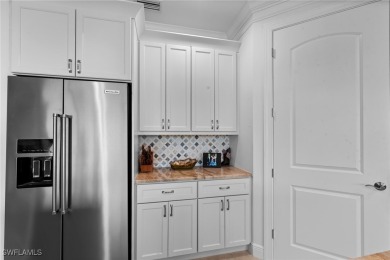 Welcome to this beautifully remodeled 2-bedroom + den, 1st-floor on Shadow Wood Preserve in Florida - for sale on GolfHomes.com, golf home, golf lot