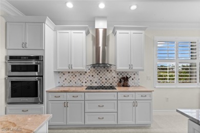Welcome to this beautifully remodeled 2-bedroom + den, 1st-floor on Shadow Wood Preserve in Florida - for sale on GolfHomes.com, golf home, golf lot