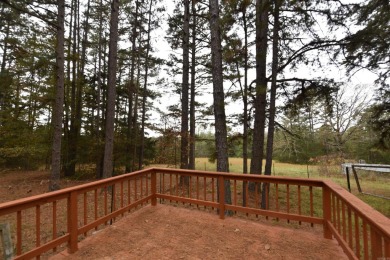 Situated on roughly 5.5 acres, this mobile home offers ample on Mountain Ranch Golf Club in Arkansas - for sale on GolfHomes.com, golf home, golf lot