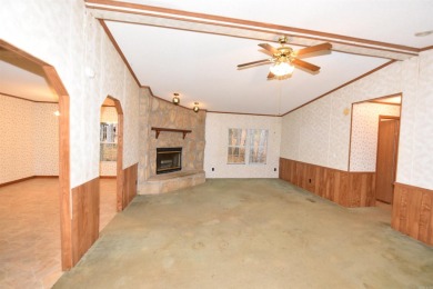 Situated on roughly 5.5 acres, this mobile home offers ample on Mountain Ranch Golf Club in Arkansas - for sale on GolfHomes.com, golf home, golf lot