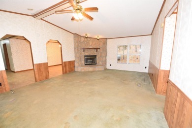 Situated on roughly 5.5 acres, this mobile home offers ample on Mountain Ranch Golf Club in Arkansas - for sale on GolfHomes.com, golf home, golf lot