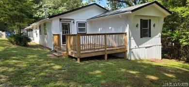 Enjoy lots of space in this newly updated home. Located in a on River Ridge Golf Club in Virginia - for sale on GolfHomes.com, golf home, golf lot