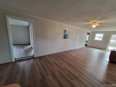 Enjoy lots of space in this newly updated home. Located in a on River Ridge Golf Club in Virginia - for sale on GolfHomes.com, golf home, golf lot