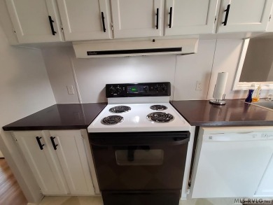 Enjoy lots of space in this newly updated home. Located in a on River Ridge Golf Club in Virginia - for sale on GolfHomes.com, golf home, golf lot